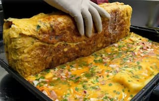 Ever Seen Anything Like This? Giant Rolled Omelette Made With 60 Eggs | Watch Viral Video