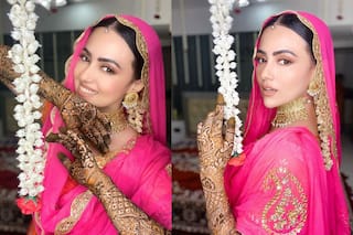Sana Khan Shares Pics From Mehendi Ceremony, Looks Fabulous in Orange-Pink Suit