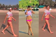 Nia Sharma Looks Unbelievable in a Pink Bikini as She Takes a Stroll on Beach in Goa - Viral Video