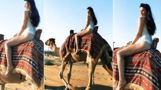 Arbaaz Khan's GF Georgia Andriani is a Hotmess Riding a Camel in White Swimsuit - Video