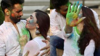 Holi 2021: राहुल वैद्य-दिशा परमार ने 'Kiss' करते हुए एक दूसरे को लगाया रंग, देखें कपल की रोमांटिक फोटो