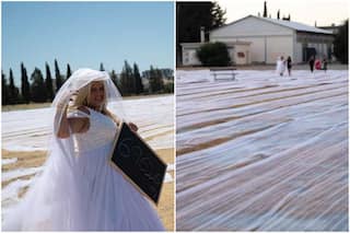 Bride Creates Guinness World Record For Wearing a Wedding Veil That's Longer Than 63 Football Fields | Watch