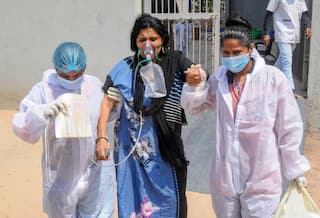 Photos Show How Hospitals, Patients Across Country Reel Under Covid-19 Stress
