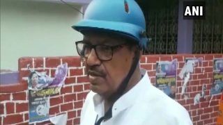 #WestBengalElections2021 LIVE: TMC-BJP कार्यकर्ताओं के बीच हिंसक झड़प, हेल्मेट पहन वोट देने पहुंचे ममता के मंत्री