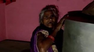 Scared of Covid Vaccine, Elderly Woman in UP's Etawah Hides Behind a Drum; Video Goes Viral | Watch