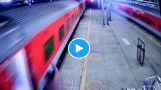 IRCTC/Indian Railways Video Viral: चलती ट्रेन से उतरते हुए धड़ाम से गिरा शख्स, ट्रेन से कट ही जाता कि RPF जवान ने बचा ली जान