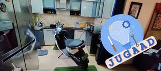 Bengaluru Resident Charges Ather 450X Electric Scooter In 5th Floor Apartment Kitchen