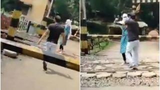 MP Woman Attempts to End Life by Standing on Rail Tracks, Brave Auto Driver Saves Her | Watch