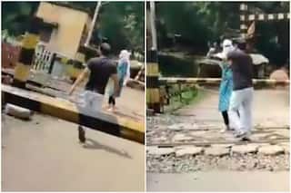 MP Woman Attempts to End Life by Standing on Rail Tracks, Brave Auto Driver Saves Her | Watch