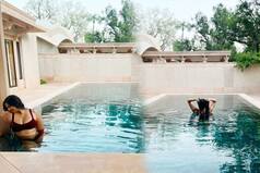 Rhea Kapoor Takes a Dip In The Pool In Sexy Black Bikini Along With BFF Masaba Gupta | See Pics