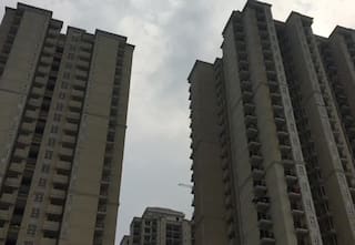 This Greater Noida Society Residents Are Using Wooden Planks to Cross Over Between 2 Towers. Here's Why