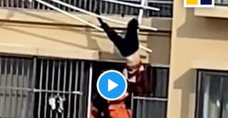82-Year-Old Woman Dangles Upside Down After Falling From 19th Floor of Building, What Happens Next | Watch