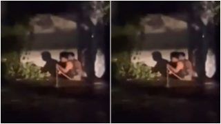 Andhra Traffic Cop Braves Raging Floodwaters to Save Stranded Priest | Watch
