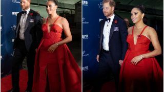 Gosh! Meghan Markle Returns to Red Carpet With Prince Harry in a Fiery Red Gown With Plunging Neckline