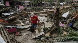 Typhoon Leaves 12 Dead, Traps People On Roofs In Philippines