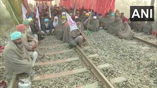 Indian Railways/IRCTC: दिल्ली-अमृतसर रेलवे ट्रैक पर बैठे किसान, 40 से ज्यादा ट्रेनें की गईं कैंसिल, चेक करें डिटेल्स