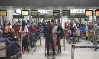 Omicron in Gujarat: UK से लौटी महिला ओमीक्रोन से पॉजिटिव, 8 बड़े शहरों नाइट कर्फ्यू बढ़ा