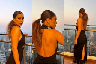 समुद्र की लहरों के बीच ब्लैक बिकिनी में सनबाथ लेती नजर आईं Nia Sharma, सेंशुअस फोटोज कर रहा है मदहोश