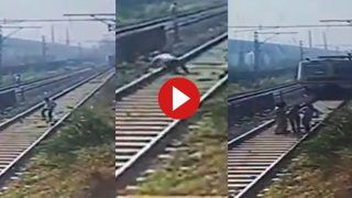 Viral Video: आत्महत्या के लिए ट्रैक पर लेट गया शख्स और पूरी रफ्तार में ट्रेन भी आ गई, मगर तभी हुआ चमत्कार | देखिए वीडियो