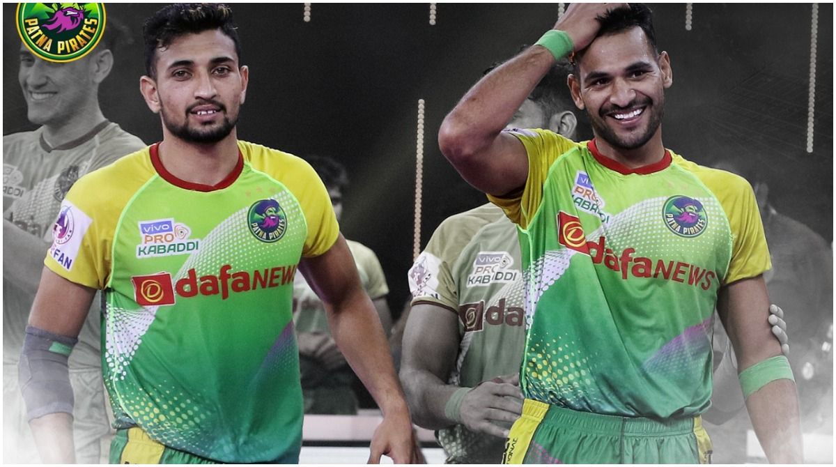 Monu Goyat, in green jersey, of Patna Pirates attempts to score a