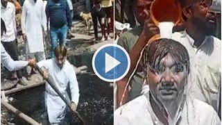 Real-Life 'Nayak'? AAP Leader Jumps Into Overflowing Drain to Clean It, Takes Milk Bath Later | Watch