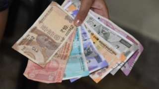 Rupee Slumps 52 Paise to All-time Low of 77.42 Against US Dollar in Early Trade