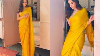 Nora Fatehi Serves The Perfect Look as Ethnic Queen in Yellow Saree And Glittering Bralette | See Video