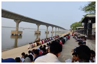 Students Congregate On Banks of River Ganga To Prepare For Railways Mock Test