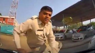 Gujarat News - AAP Leader Drags Cop on Car Bonnet, Held Under Attempt to Murder Charges - Watch Video