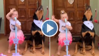 Adorable Video of Little Girl Singing & Performing With Her Pet Dog Will Make You Smile | Watch