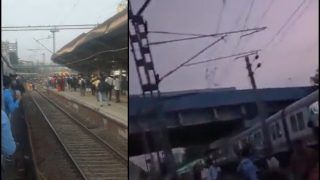 Mumbai Local Delayed : मुंबई में लोकल ट्रेनों में तकनीकी गड़बड़ी के कारण हुईं ठप, यात्री पैदल पटरियों पर चलते नजर आए