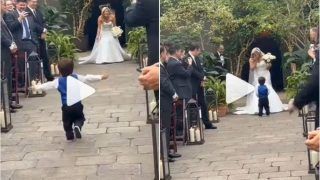 Viral Video: Bride's Son Runs Over To Hug Her As She Walks Down The Aisle. Watch