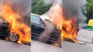 Video: Car Catches Fire Near Delhi's Moolchand Metro station after Hitting Divider; Driver Injured