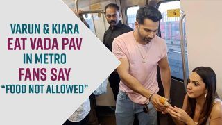 Viral Video: Varun Dhawan and Kiara Advani Spotted Eating Vada Pav in Metro, Netizens Say, Food Not Allowed in Metro