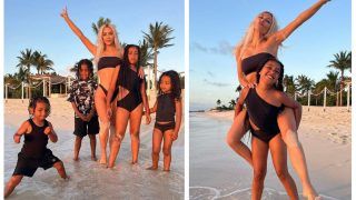 Kim Kardashian In A Skimpy Black Bikini Shares Adorable Beach PICS With All Her Four Kids, Gets Piggyback Ride From Daughter North