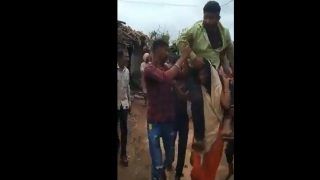 Tribal Woman Beaten Up, Paraded And Forced To Carry Her Husband in MP's Dewas | Watch