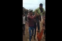Tribal Woman Beaten Up, Paraded And Forced To Carry Her Husband in MP's Dewas | Watch