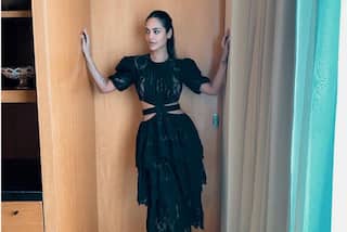 Esha Gupta Raises Hotness in Asymmetric Black Dress With Sexy Waist Cut Outs     PICS