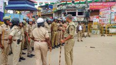 Shivamogga में पुलिस का फ्लैग मार्च, गृह मंत्री ने अधिकारियों संग की उच्च स्तरीय बैठक; गुरुवार तक लागू रहेगी धारा 144