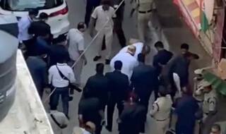 Video: Telangana BJP Chief Faces Flak For Fetching Amit Shah's Shoes Outside Temple | WATCH