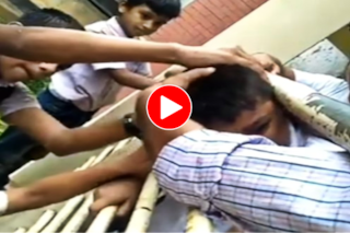 Viral Video: पतली सी जगह में बुरी तरह अटक गया लड़के का सिर, आगे जो हालत हुई यकीन ना करेंगे- देखें वीडियो