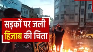 Iran Hijab Protest: ईरान में बीच सड़क पर महिलाओं ने जलाए हिजाब, प्रदर्शन में अबतक 9 लोगों की हो चुकी है मौत | Watch Video