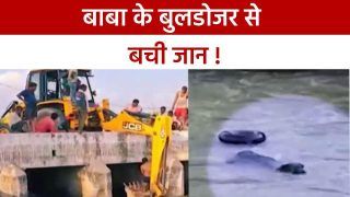 यूपी में बुलडोजर की वजह से बची पशुओं की जान, नहर में फंस गई थी किसानों की भैस | Watch Video