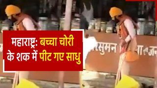 Maharashtra News: महाराष्ट्र में बच्चा चोर समझकर साधुओं की बेरहमी से पिटाई, गाड़ी से टांग पकड़कर खींचा, फिर चलाए लात-घुसे | देखें वीडियो