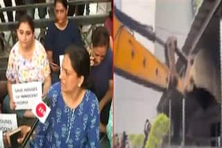 नोएडा में बहुचर्चित ग्रैंड ओमैक्स सोसायटी में अवैध निर्माण पर चला बुलडोजर, लोगों का प्रदर्शन