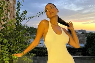 Esha Gupta Flaunts Hour-Glass Figure in White Bodycon Maxi Dress- See Hot And Sensuous Pics From Spain