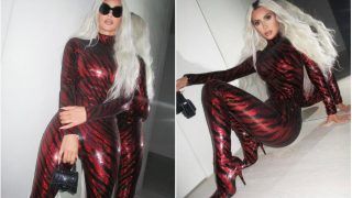 Kim Kardashian Sparkles In Red & Black Striped Catsuit At Beyonce's Disco-Themed 41st Birthday Bash- See Pics