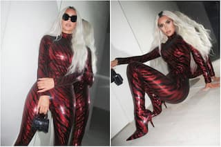 Kim Kardashian Sparkles In Red Catsuit At Beyonce's Disco-Themed 41st Birthday Bash