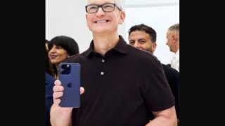 Apple CEO Tim Cook Greets First iPhone 14 Buyers at Iconic New York Store