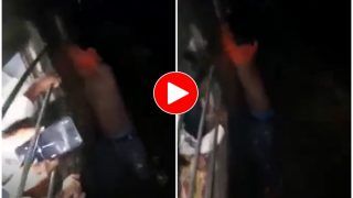 Viral Video: मोबाइल चुराकर भाग रहा था शख्स, लोगों ने ट्रेन के बाहर लटकाए रखा और फिर...वायरल हो रहा वीडियो